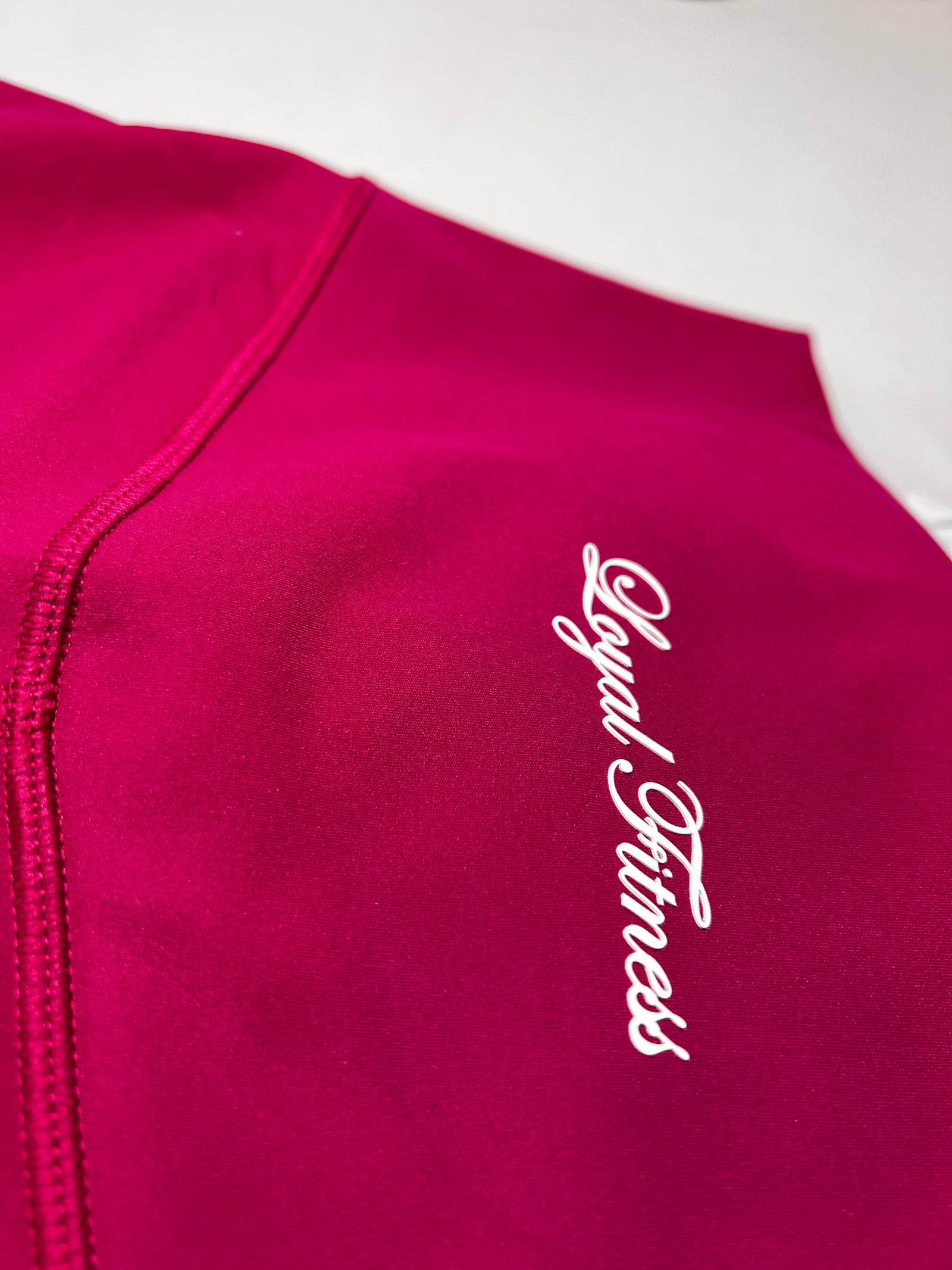 Legging magenta avec poche arrière