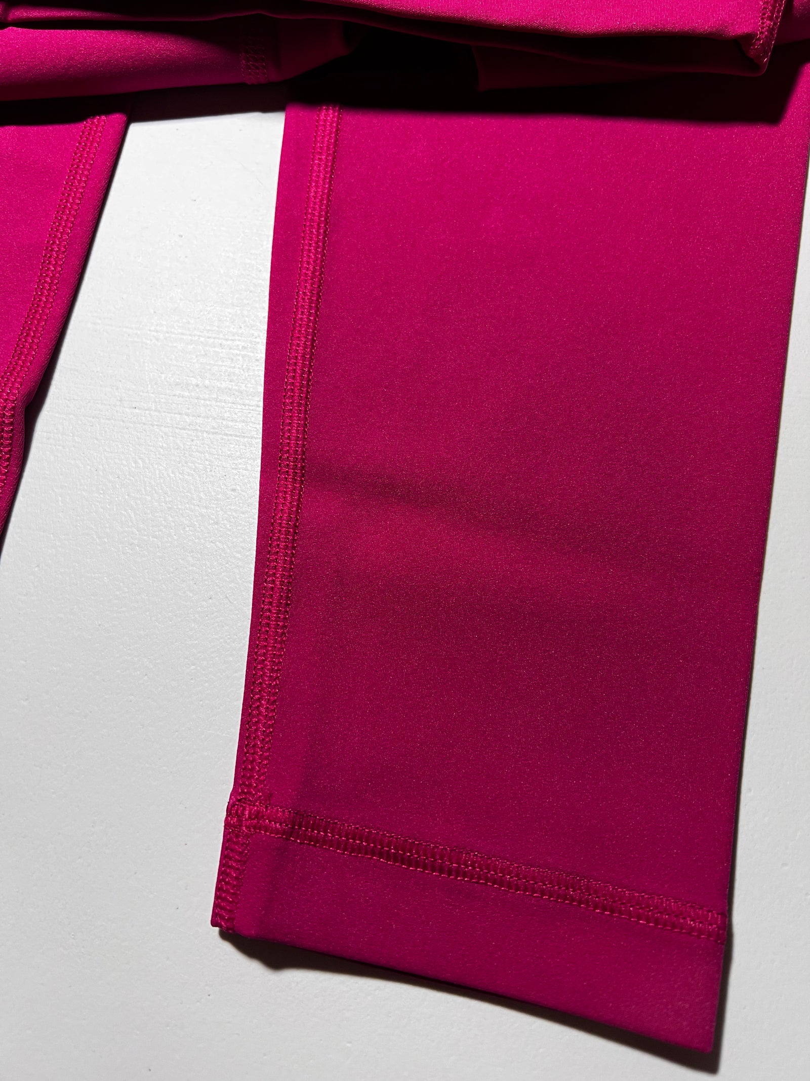 Legging magenta avec poche arrière