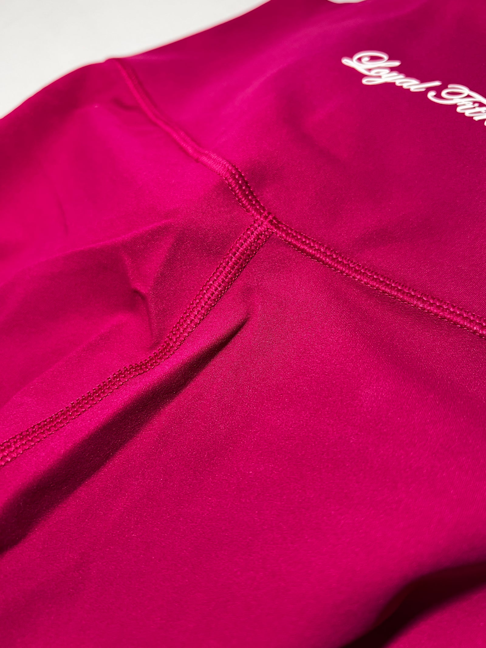 Legging magenta avec poche arrière